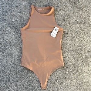 Abercrombie nude bodysuit. Tags still on. Never worn.